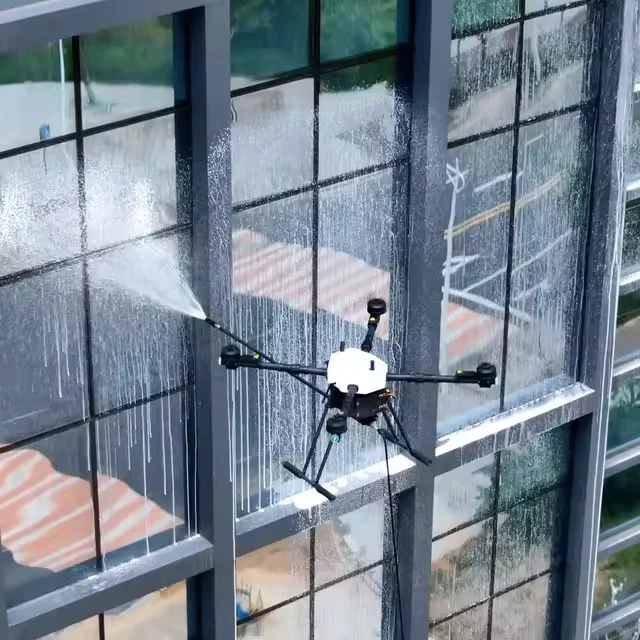 Wash drone cleaning exterior windows on a commercial building