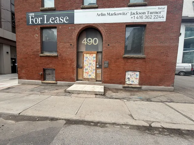 Clean brick facade after graffiti removal