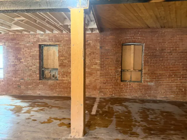 Century-old brick blasted back to its original face